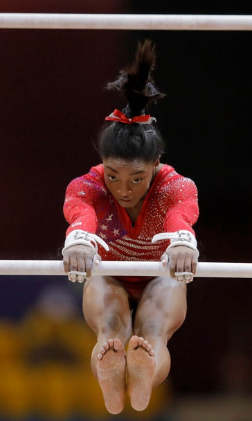 Still golden: Biles, Americans roll at world championships